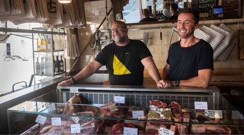 Richard Turner and James George behind the butchers counter at EC1