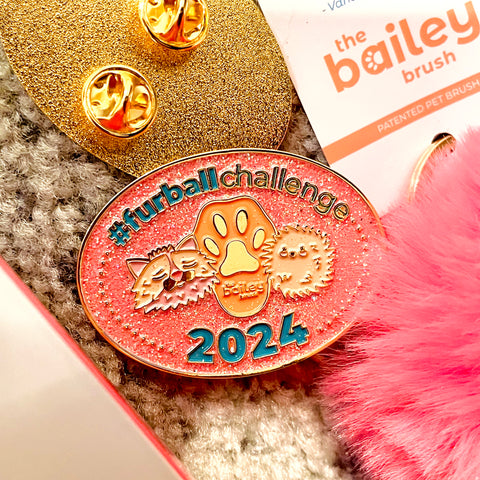 The coveted furball challenge medal