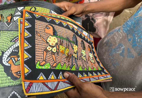 Pattachitra art holded by an artisan