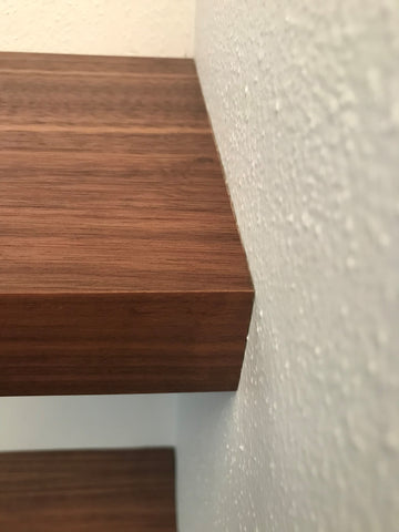 Walnut shelf fitted to inside corner