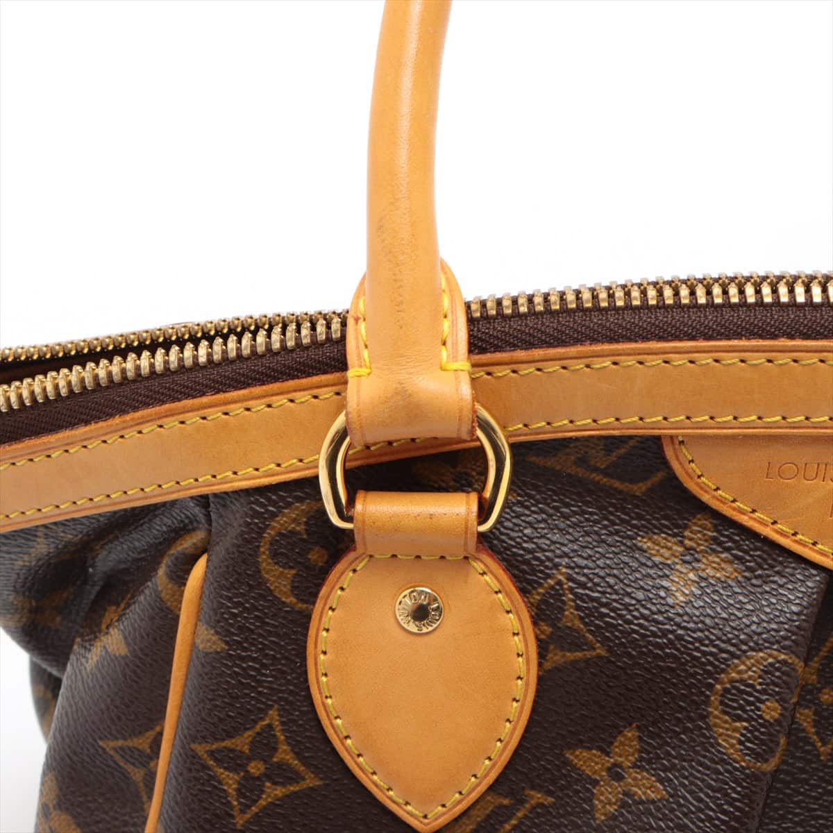 Throwback Thursday: An Ode to the Discontinued Louis Vuitton Tivoli -  PurseBlog