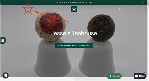 Image of the Jesse's Teahouse Home screen with a red star around the drop down menu in the top left hand corner and a red arrow pointing towards it.