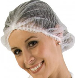 A woman wearing a recyclable white Bouffant cap