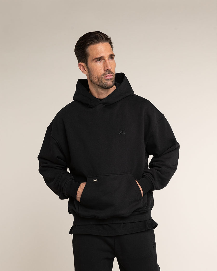 Black Oversized Hoodie - Stilvoller Streetwear-Look. Hochwertige Baumwolle für maximalen Komfort