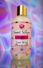 A bottle of Sweet Silken Kitty Yoni Wash