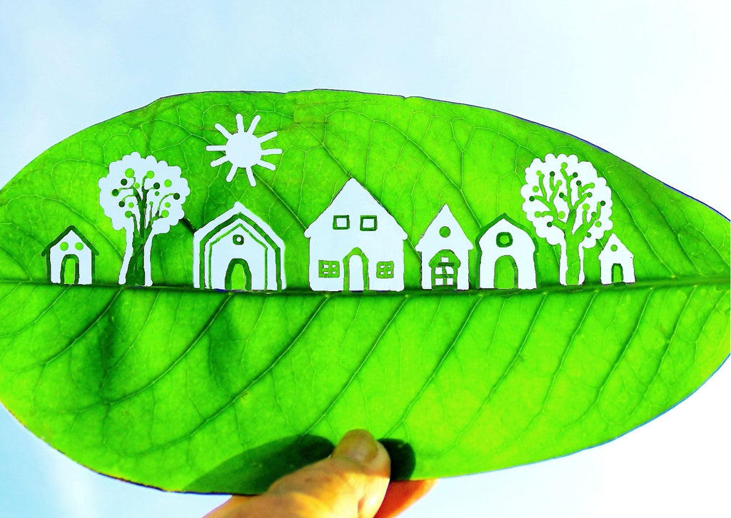 Leaf with picture of trees and houses on it