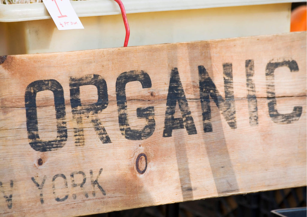 The word Organic on a wooden board