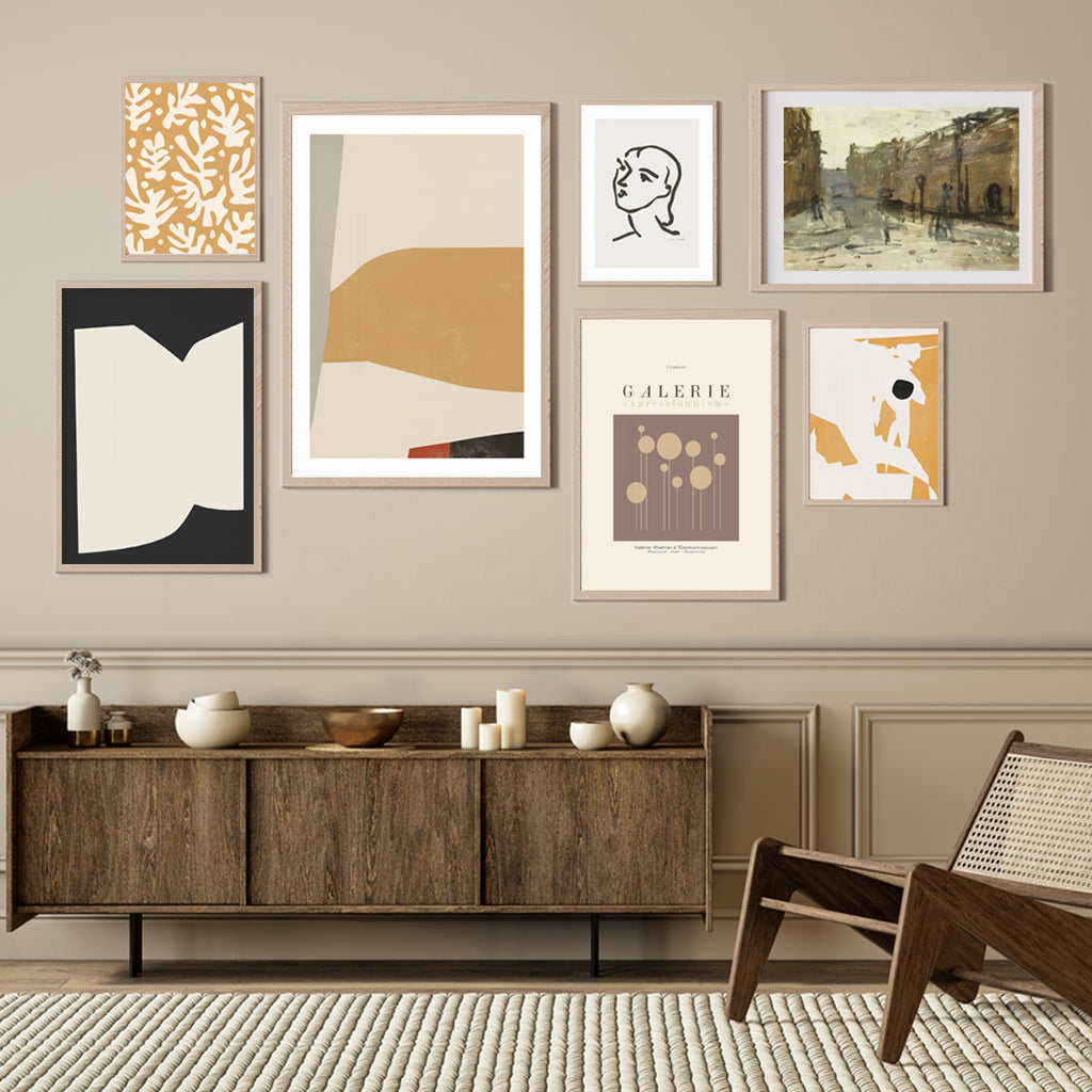 mid-century-chair-large-gallery-wall-yellow-beige-abstract-posters