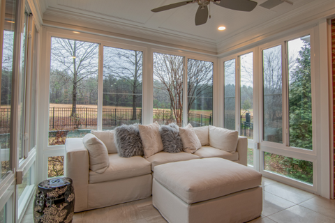 cosy sofa in front of big windows