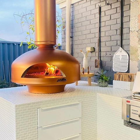 polito oven in copper with wood fire logs