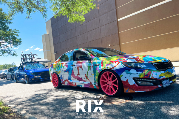 Paint splattered car wrap with pink wheels Rix magazine Superfly show