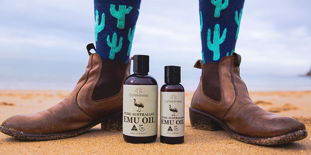 Closeup of oil next to lady wearing boots with cactus socks