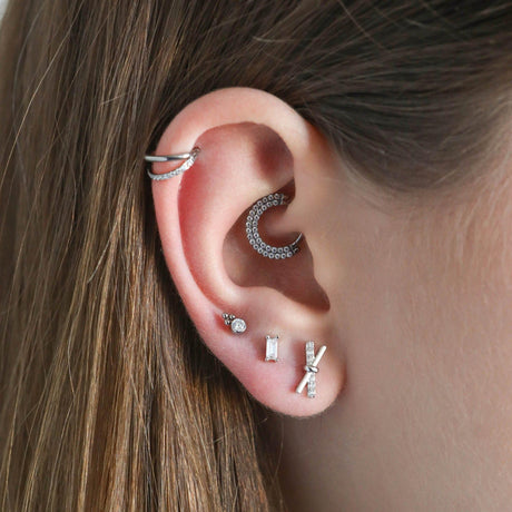 black widow ear piercings