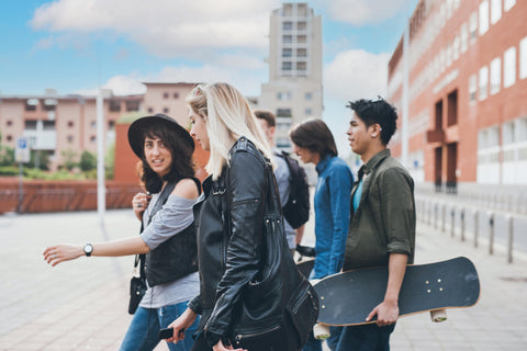 group of friends walking outside building