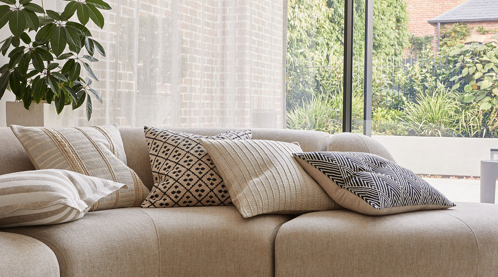 Mallorca Collection by Weave. Neutral cushions. Pattern cushions. Couch with cushions