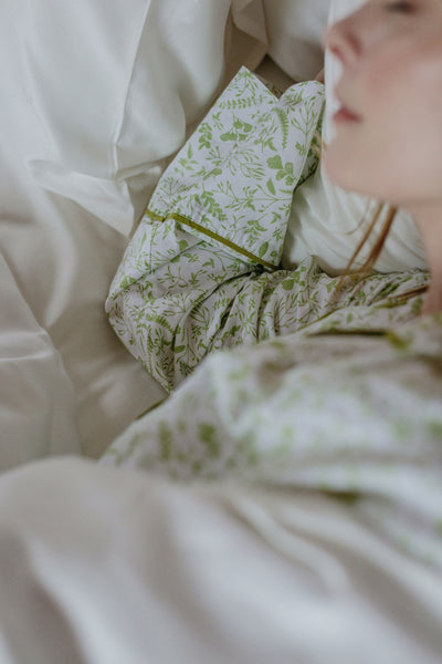 Woman asleep Foxford bamboo bedding and Foxford pyjamas