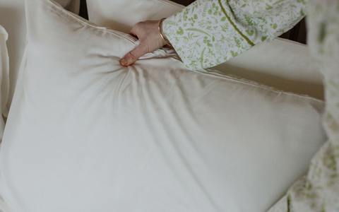 hands on a bamboo pillow