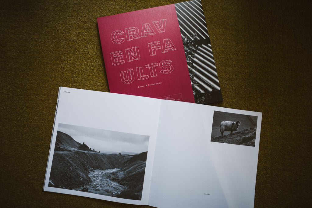 Picture of back cover and accompanying photobook of Craven Faults Erratic & Unconformities vinyl LP.