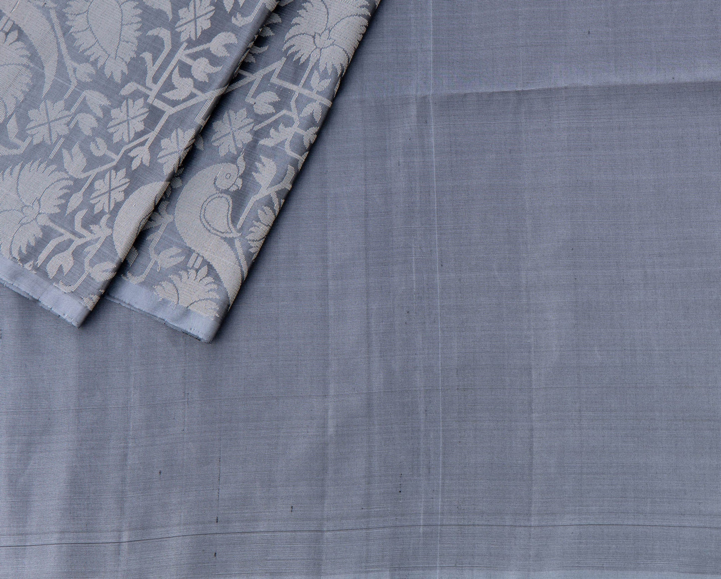 Purple soft silk saree with long grey brocade border