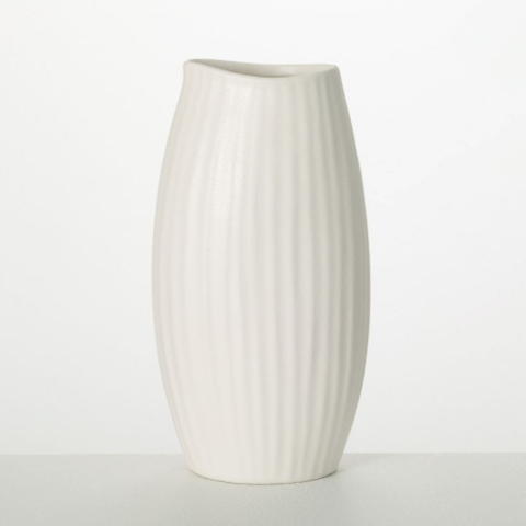 A white ceramic vase with a modern ribbed design.