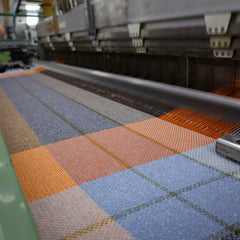 Wildcat Den cotton yarn woven together on the loom