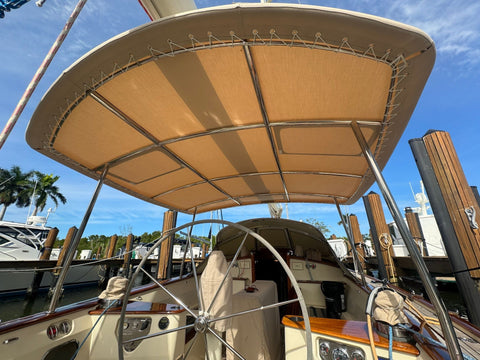 Showcasing the exquisite Lace On T-Top with its stainless steel frame, Sunbrella® fabric, and EZ2CY windows, all elegantly installed on the Friendship 40