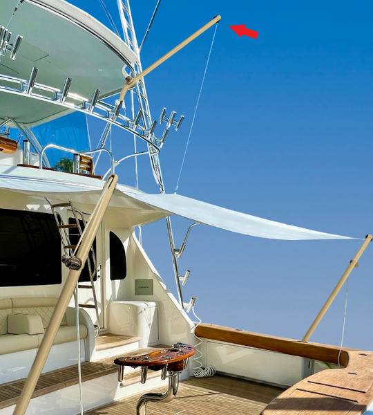 tan aluminum Powder coated Topping lift poles with sunfly cover on sport fisher