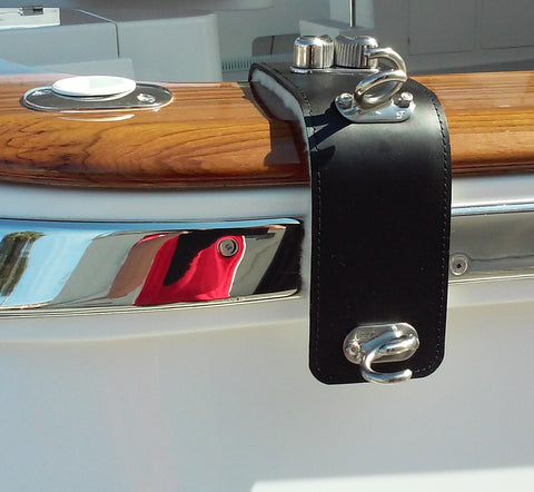 Yacht rail fender hook in installed on caprail