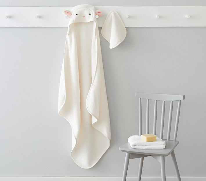 a baby hooded towel on a hanger