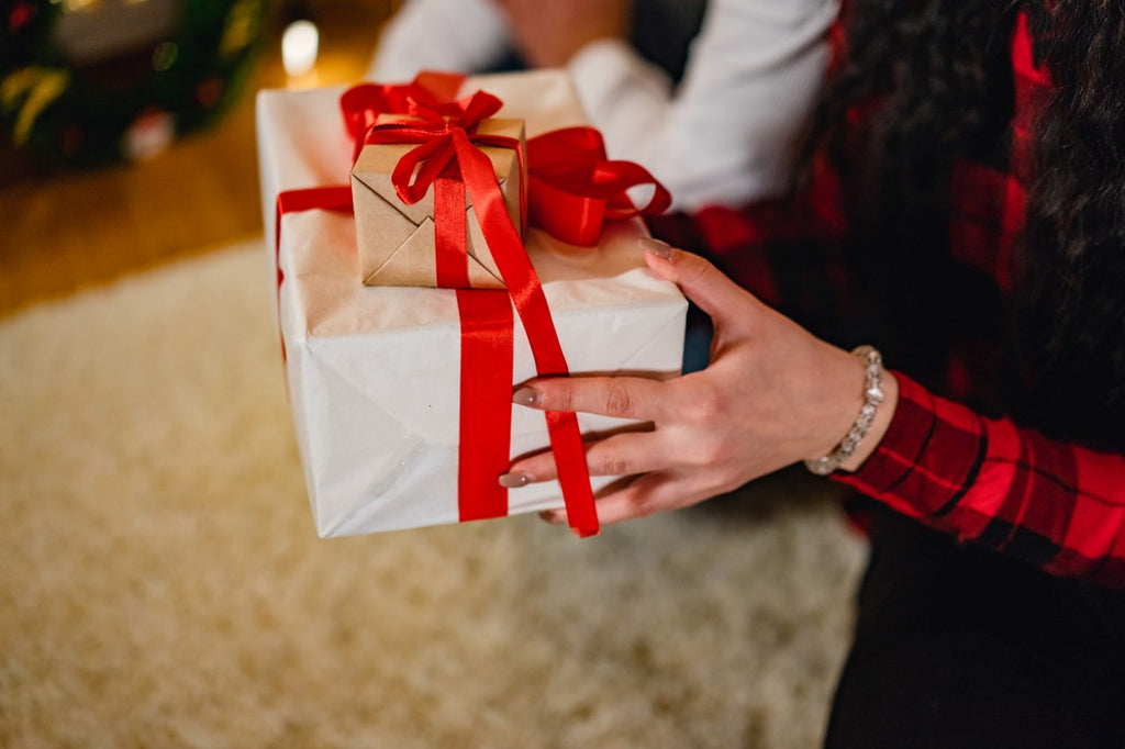 woman holding presents