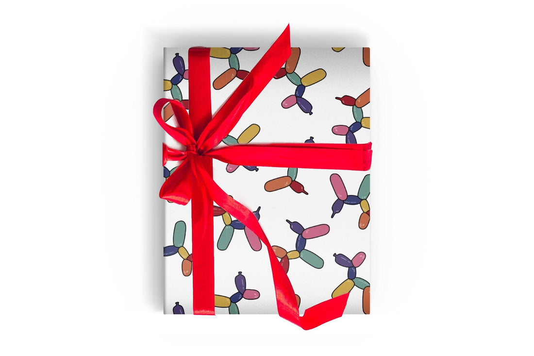 Wrapping Paper with a Colorful Balloon Dog pattern and a red ribbon