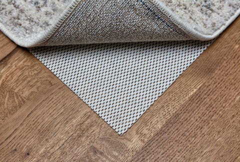 how to stop rugs creeping on carpet