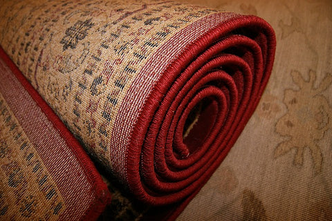 how to stop rugs creeping on carpet