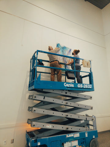 La Seduisante Dragonne painting by Melanie Kilsby being installed at the Cultural Centre