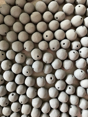 handmade ceramic beads drying
