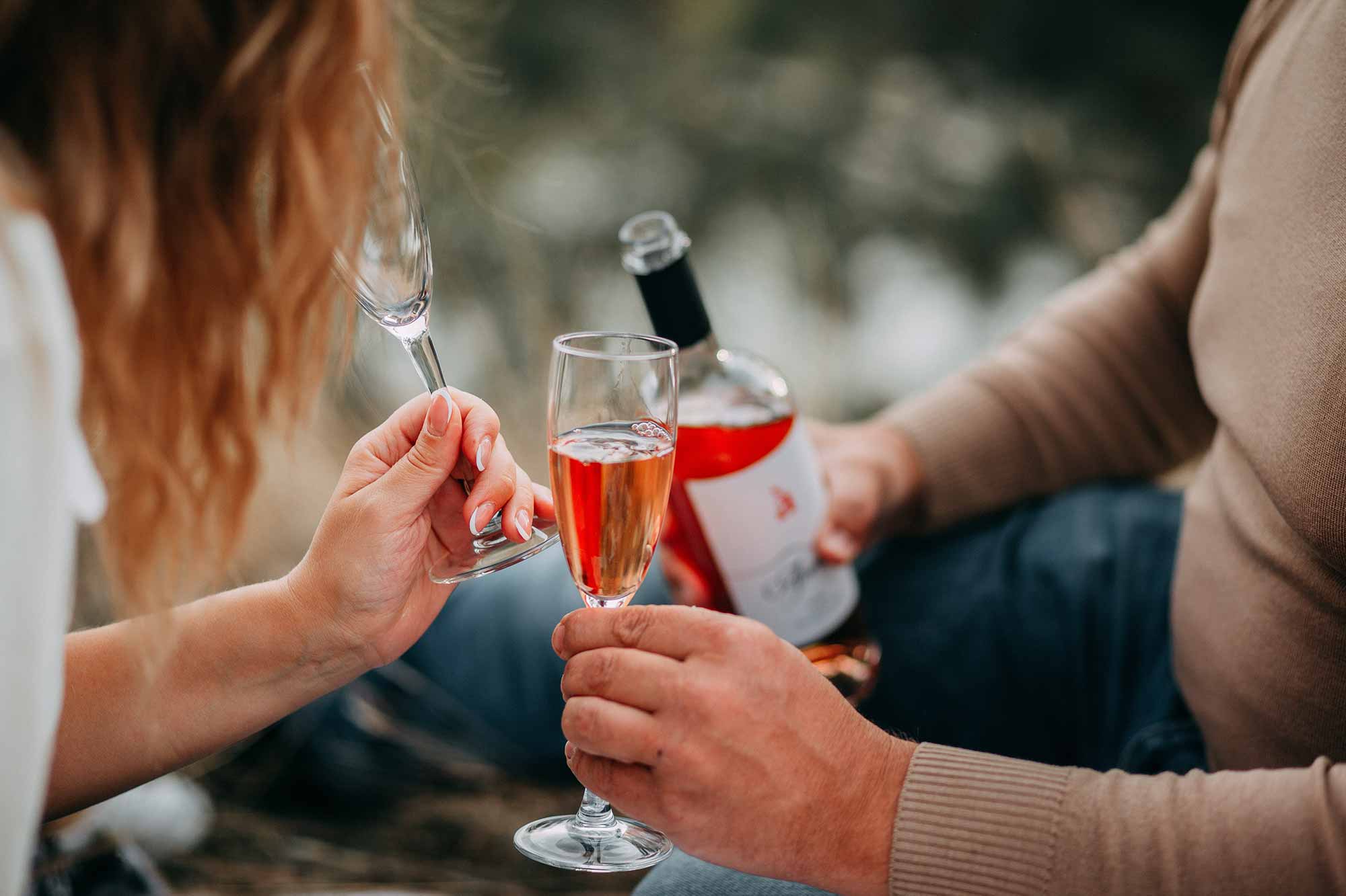 couple drinking rose wine