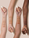 ILIA True Skin Serum Foundation swatches shown on multiple skin tones.