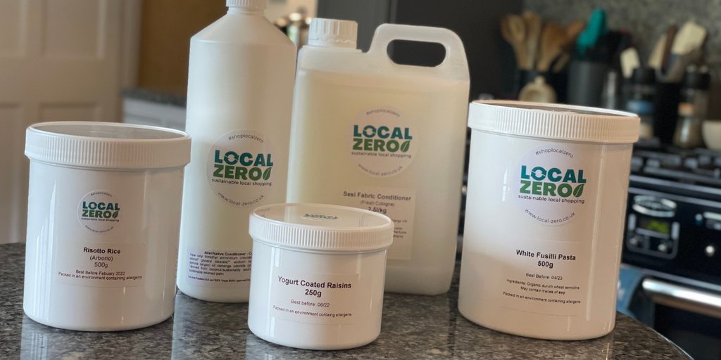 A variety of Local Zero reusable packaging containers arrange on a kitchen worktop