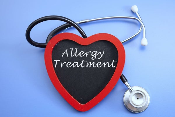 Allergy treatment written on heart with stethoscope 