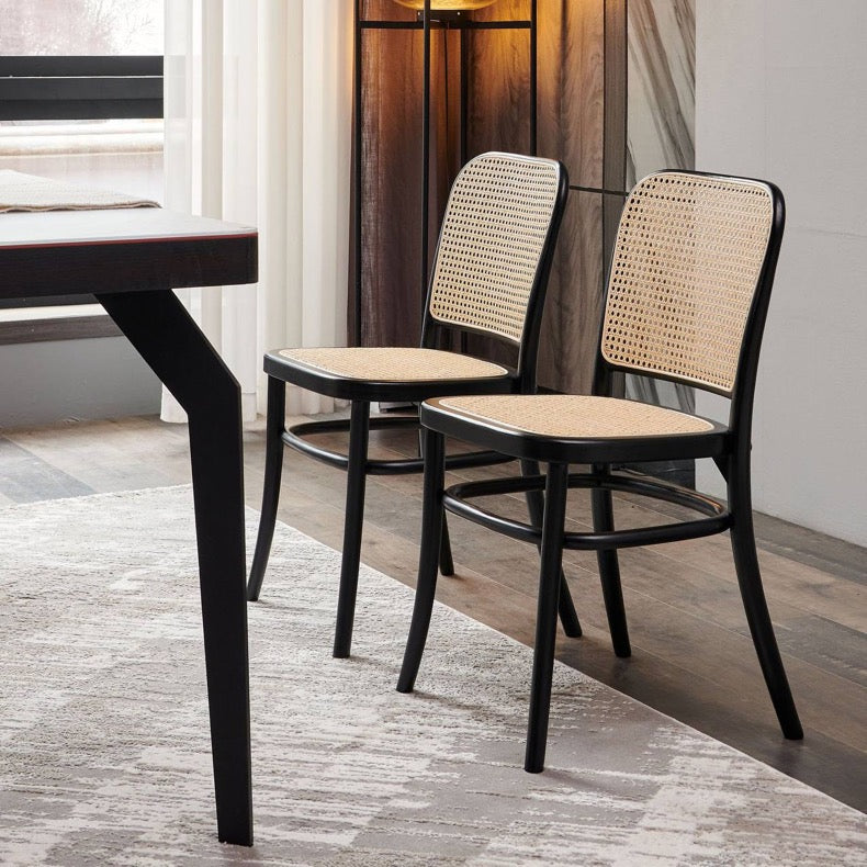 black rattan chairs and table