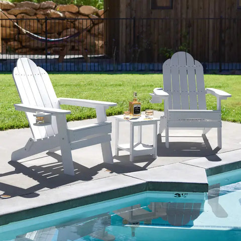 2 White Foldable Adirondack Chairs with Cup Holder With Side Table at Poolside