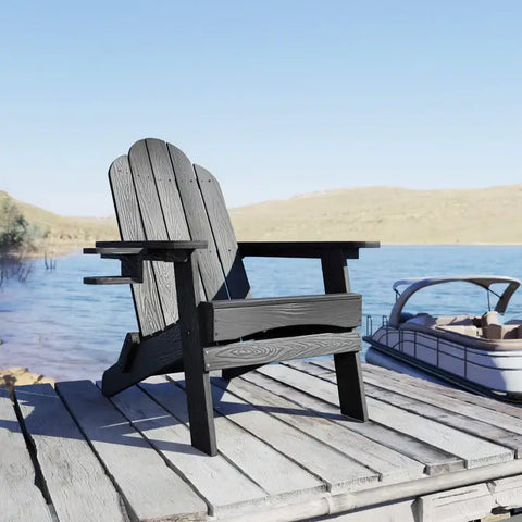 Black Foldable Adirondack Chair with Cup Holder near the Lake