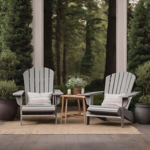 grey Adirondack chairs with cushions paired with muted decor
