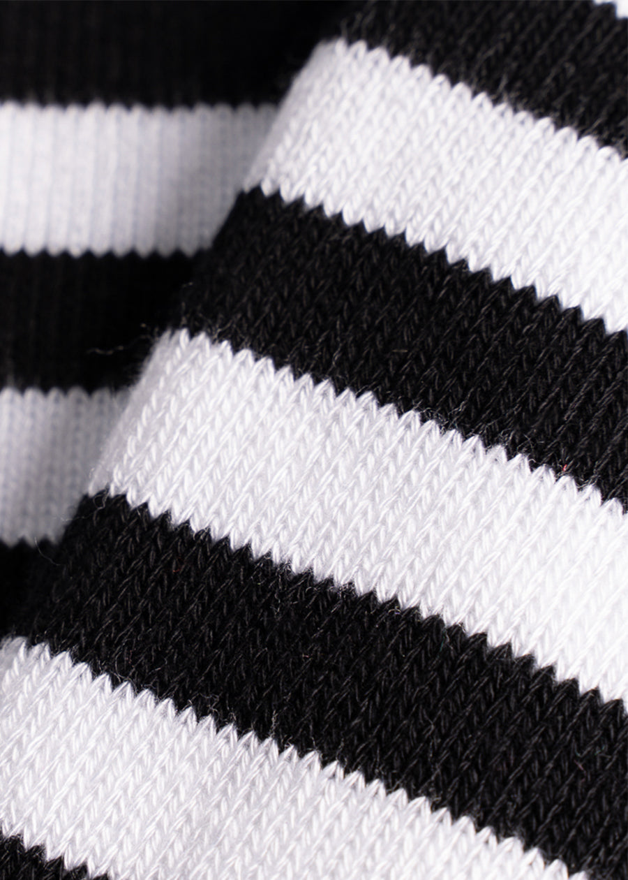 she wear black and white organic bamboo women's thick long socks fabric close up