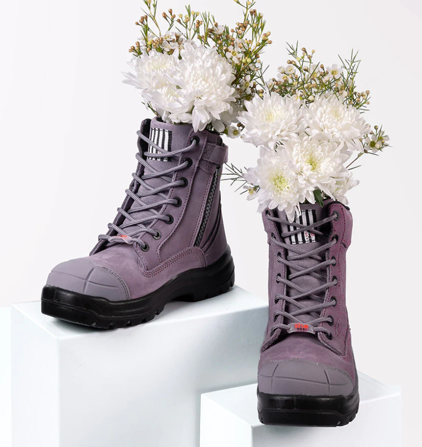 she achieves purple with flowers, she wear sustainability and ethics