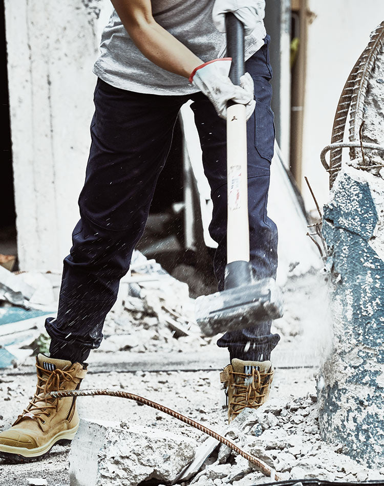 woman wearing she achieves knocking down wall