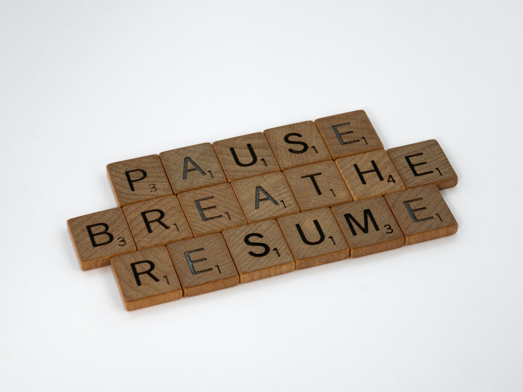 Pause breathe resume scrabble letters arranged