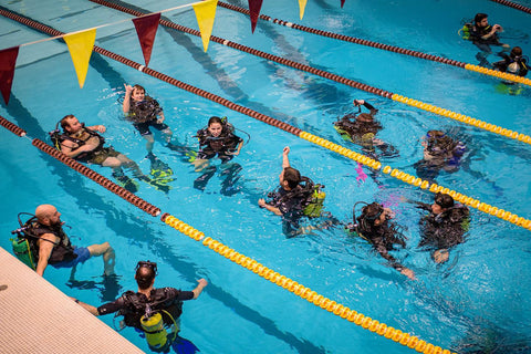 Refresher Divers training in the pool with Learn Scuba Chicago