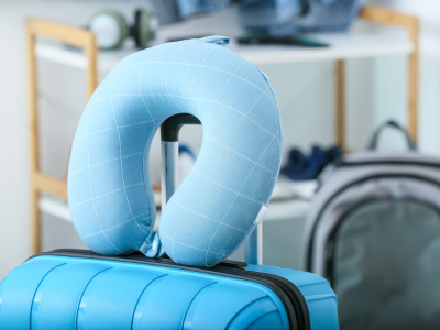 travel pillow on luggage