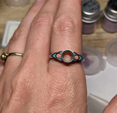 Ring with fresh enamel applied but not yet fired